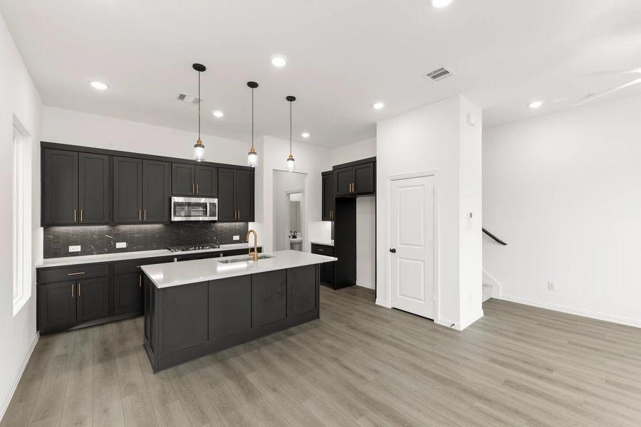 Kitchen featuring the Noir Collection Kitchen featuring the Noir Collection