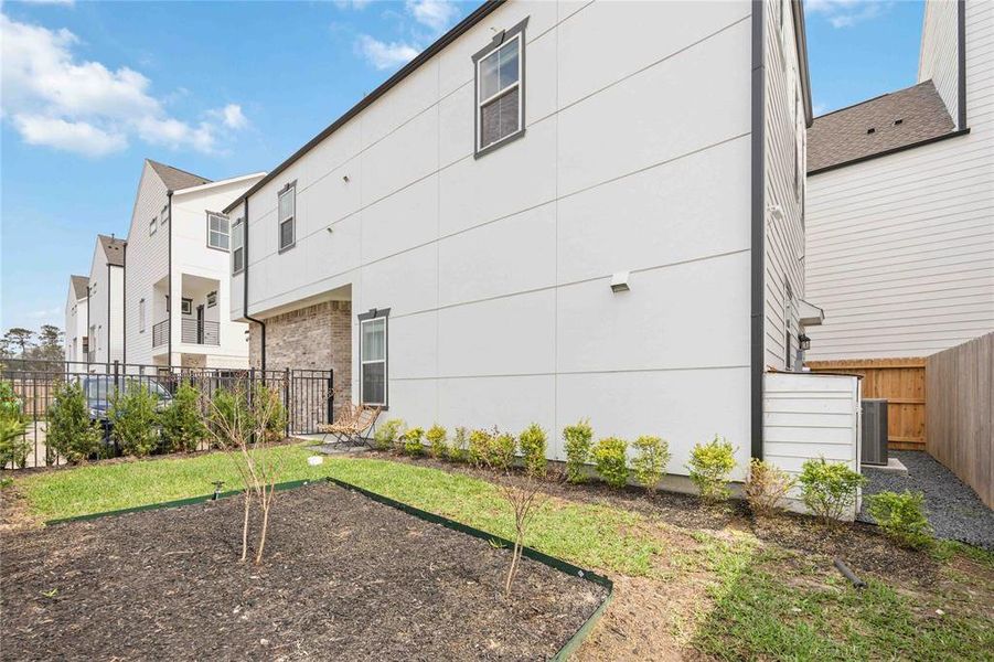 Another view of your private yard just off the kitchen can be your own entertaining oasis!