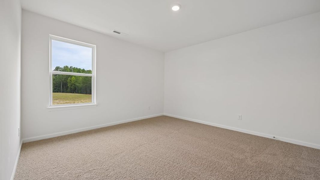 Spacious, unfurnished interior of a new home in Mangum Farms, Stem (Image 25).