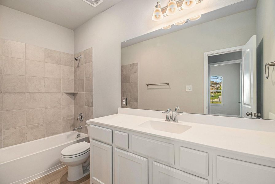 Furnished interior view inside a new home in Clear View Estates, Willis (Image 7).