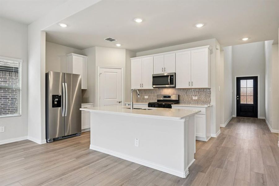 Furnished interior view inside a new home in Parks at Foster Crossing - Signature Series, Anna (Image 5).