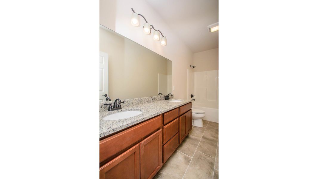 Representative furnished interior of a home built from the The Abington by Norfolk Homes in Valleys, Jackson (Image 49).