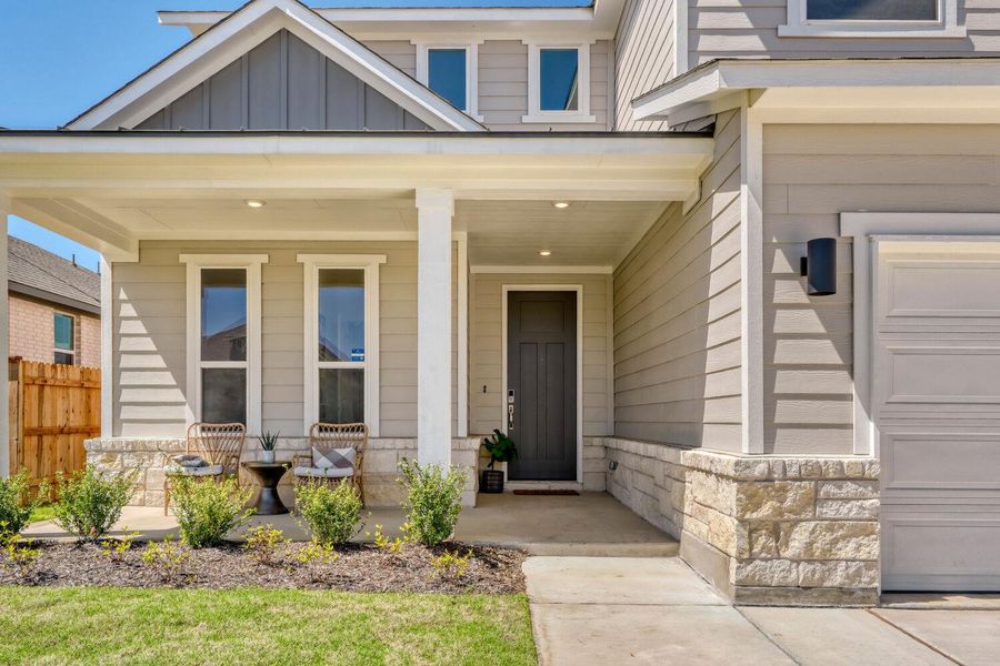 Exterior details and patio area of a home in Freedom at Anthem, Kyle (Image 3).