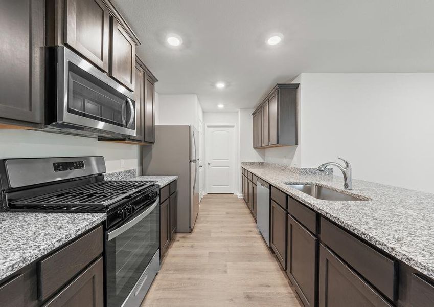 The kitchen of the Cedar has energy-efficient appliances.