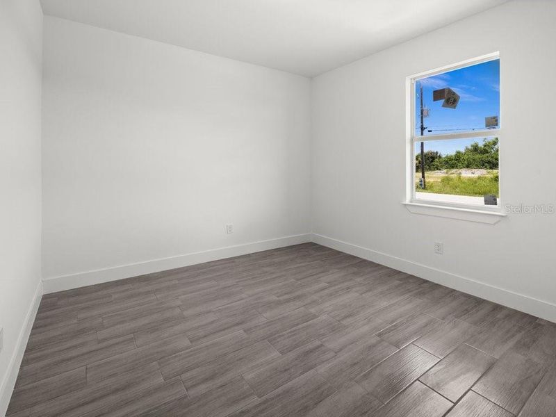 Spacious, unfurnished interior of a new home in , Port Charlotte (Image 16).