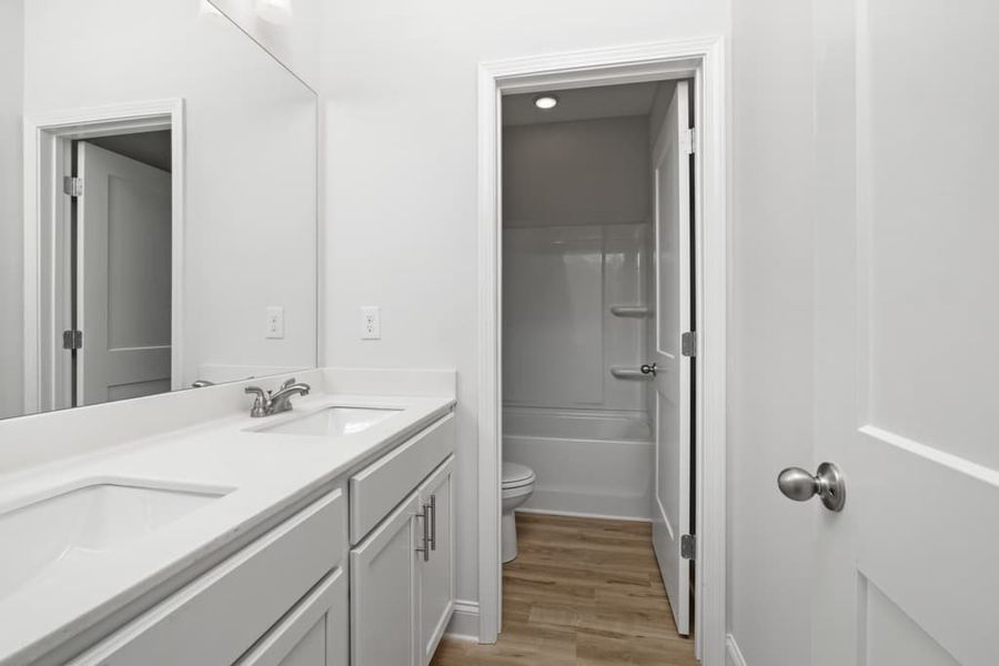 Representative furnished interior of a home built from the Atkinson by UnionMain Homes in Austin Springs, Bethlehem (Image 11).