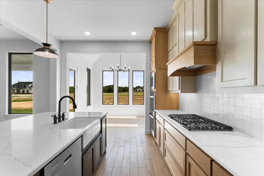 Representative furnished interior of a home built from the The Aylin by Doug Parr Custom Homes in Kessler Farms, Brock (Image 18).