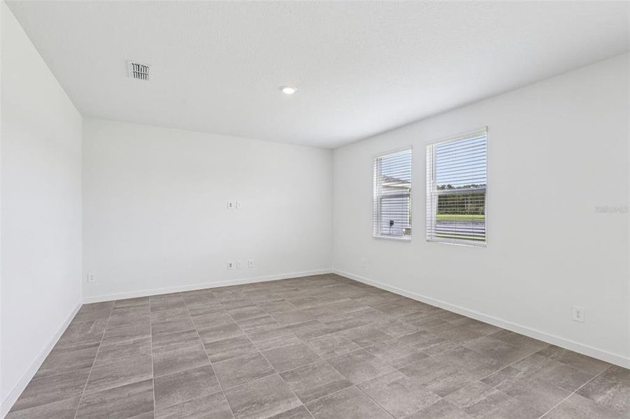 Spacious, unfurnished interior of a new home in Flagler Village - Signature Series, Palm Coast (Image 31). Spacious, unfurnished interior of a new home in Flagler Village - Signature Series, Palm Coast (Image 31).