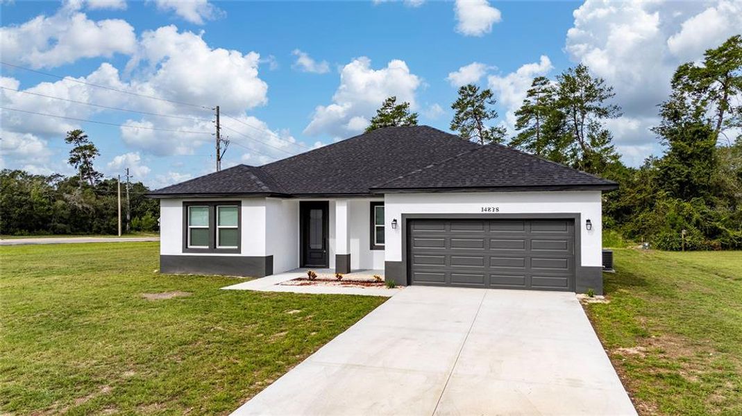 Front exterior of a new home in , Ocala, FL, highlighting curb appeal (Image 2).