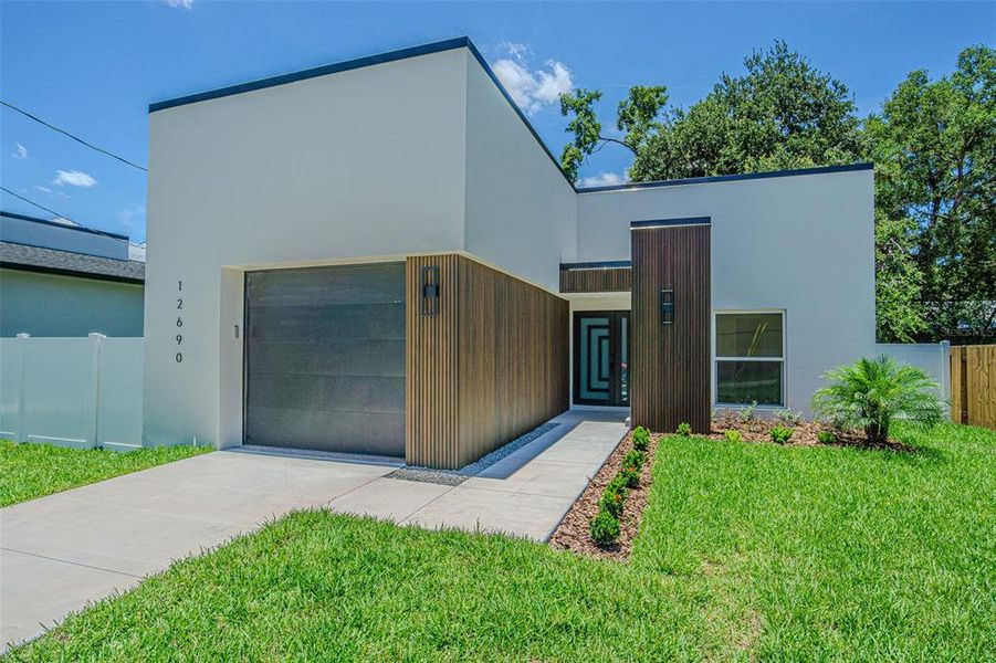 Front exterior of a new home in , Tampa, FL, highlighting curb appeal (Image 2). Front exterior of a new home in , Tampa, FL, highlighting curb appeal (Image 2).