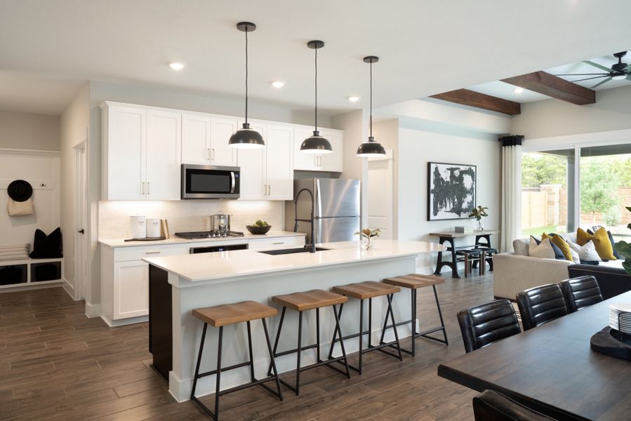 Open floorplan showcasing kitchen, spacious gather