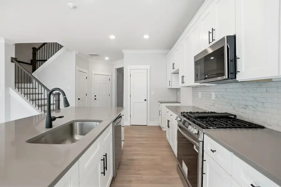 Furnished interior view inside a new home in Blythe Mill Townhomes, Waxhaw (Image 11). Furnished interior view inside a new home in Blythe Mill Townhomes, Waxhaw (Image 11).