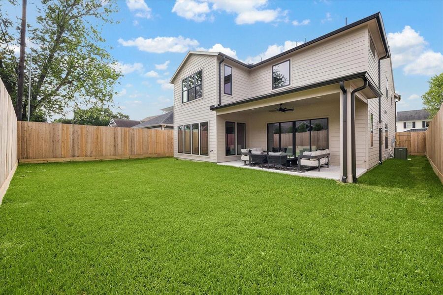 Exterior details and patio area of a home in , Houston (Image 3). Exterior details and patio area of a home in , Houston (Image 3).