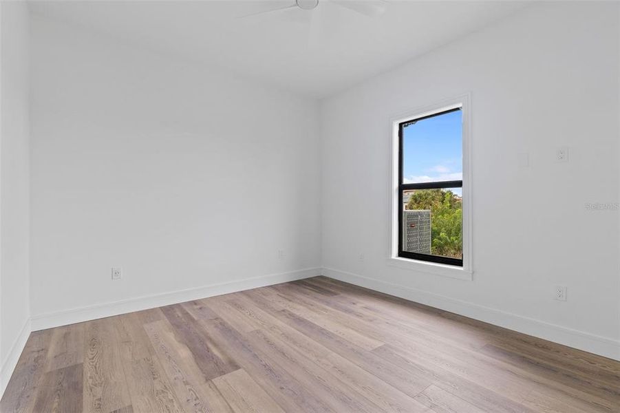 Spacious, unfurnished interior of a new home in , Port Charlotte (Image 28).