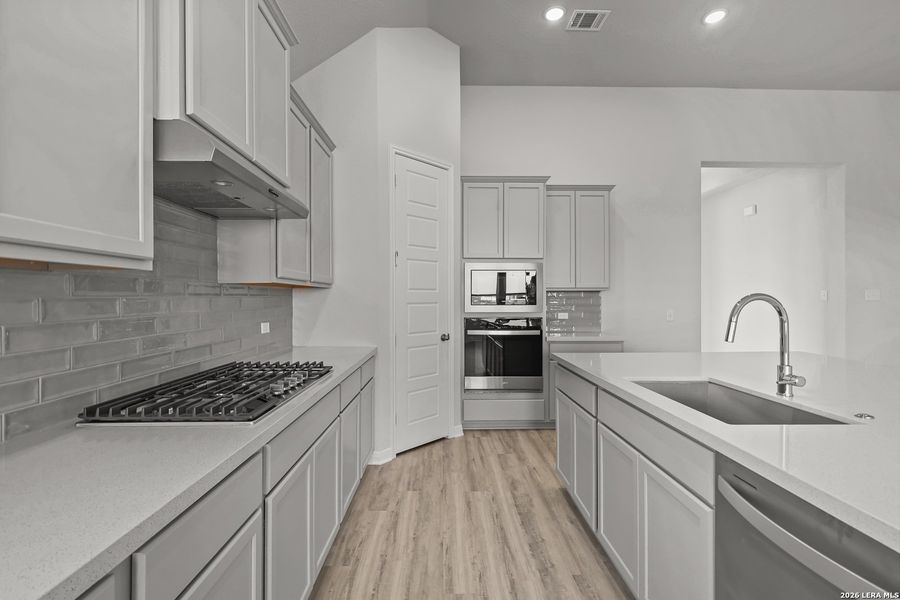 Furnished interior view inside a new home in Ladera, San Antonio (Image 6).