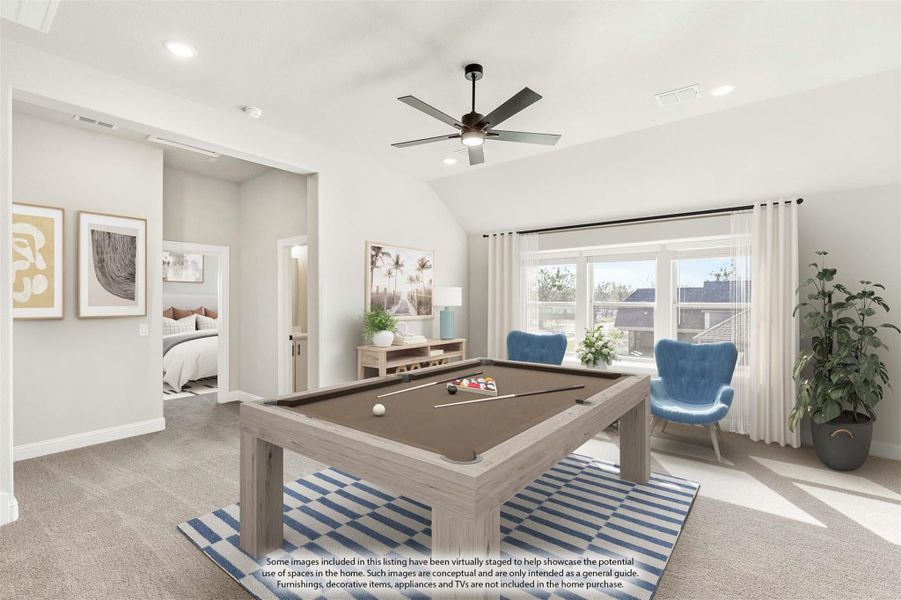 Game room with pool table, vaulted ceiling, ceiling fan, and large windows with natural light Game room with pool table, vaulted ceiling, ceiling fan, and large windows with natural light