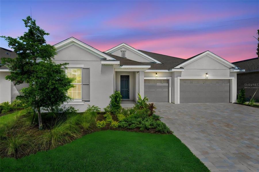 Front exterior of a new home in Creekside Run at Babcock Ranch, Punta Gorda, FL, highlighting curb appeal (Image 2). Front exterior of a new home in Creekside Run at Babcock Ranch, Punta Gorda, FL, highlighting curb appeal (Image 2).
