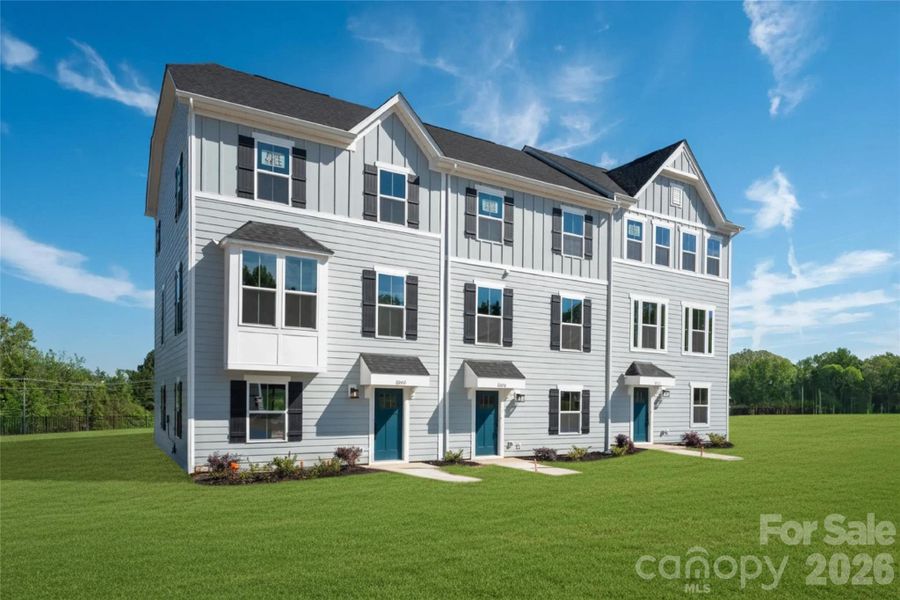 Front exterior of a new home in Stowe Branch Townhomes, Charlotte, NC, highlighting curb appeal (Image 1). Front exterior of a new home in Stowe Branch Townhomes, Charlotte, NC, highlighting curb appeal (Image 1).
