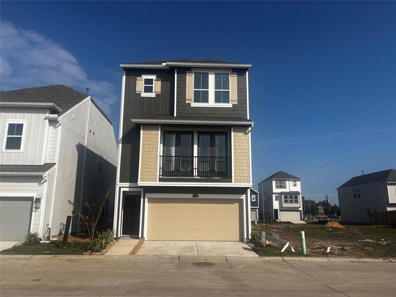 Three story home with 3 beds, 3.5 baths, and 2 car garage