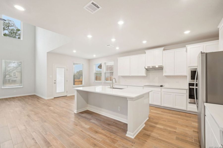 Furnished interior view inside a new home in Estancia Ranch - Classic Series, San Antonio (Image 16).