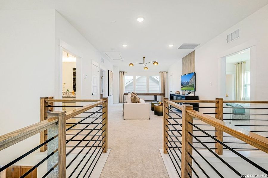 Furnished interior view inside a new home in Nopal Valley, San Antonio (Image 13).