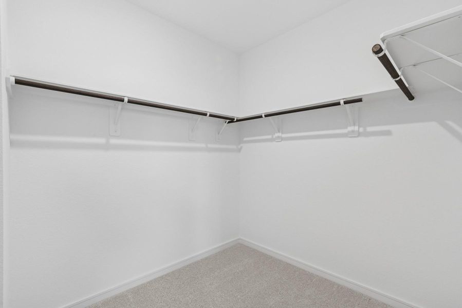 Walk-in closet in the primary suite
