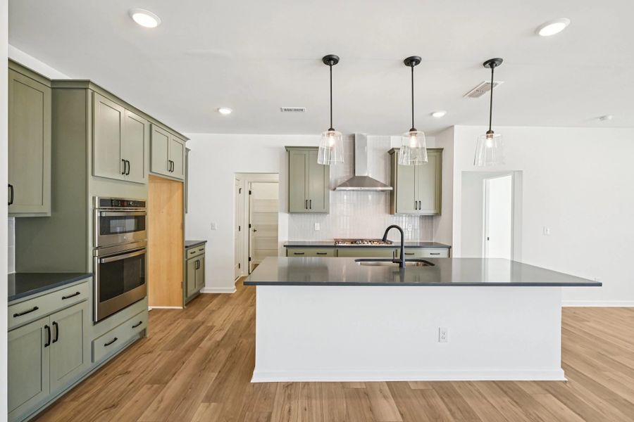 Kitchen featuring the AW Collection® Rosemary - Matte black, light wood, and garden-inspired style