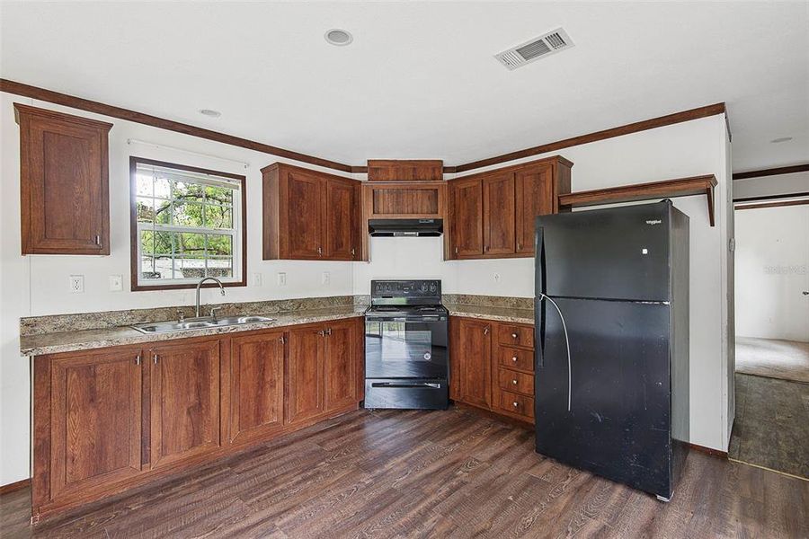 Furnished interior view inside a new home in , Astor (Image 4).