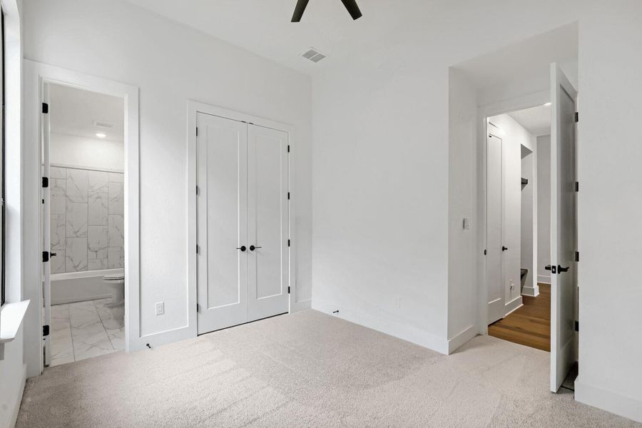 Spacious, unfurnished interior of a new home in 6 Creeks at Waterridge, Kyle (Image 23).