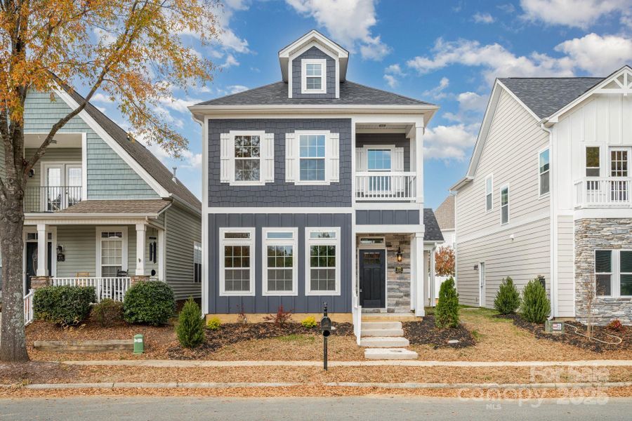 Front exterior of a new home in , Indian Trail, NC, highlighting curb appeal (Image 1). Front exterior of a new home in , Indian Trail, NC, highlighting curb appeal (Image 1).