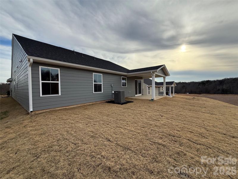 Exterior details and patio area of a home in Overture Pointe, Hickory (Image 27).