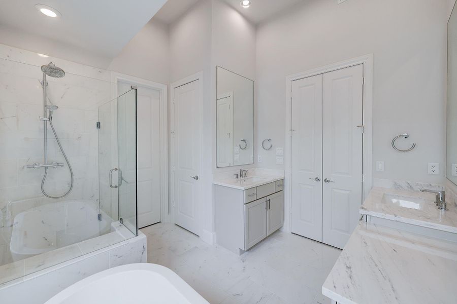 Gorgeous Primary Bathroom - Marble Countertops and Floors. Free Standing Tub and Seated Shower. Gorgeous Primary Bathroom - Marble Countertops and Floors. Free Standing Tub and Seated Shower.