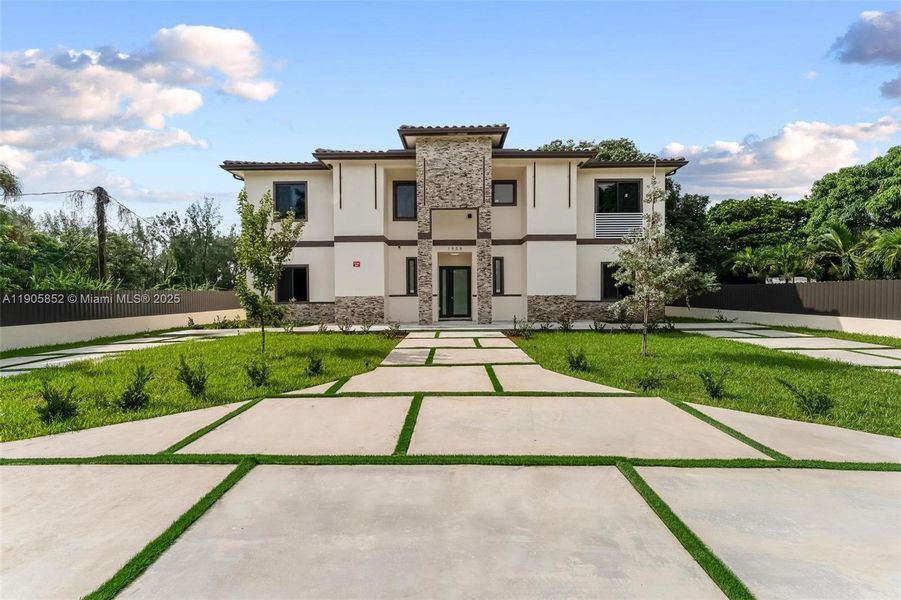 Front exterior of a new home in , Miami, FL, highlighting curb appeal (Image 1).