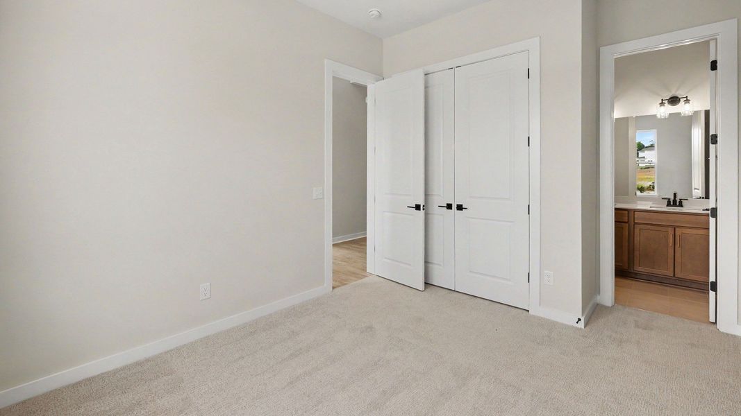 Bedroom located on the first floor at the front of the home with en-suite bathroom