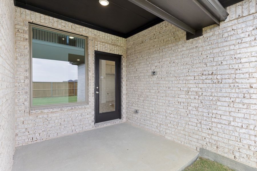 Exterior details and patio area of a home in Sutton Fields, Celina (Image 3).