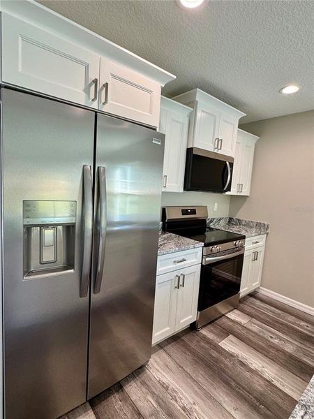 Furnished interior view inside a new home in , Dunnellon (Image 6).