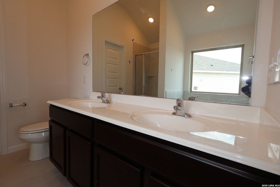 Furnished interior view inside a new home in Verano Farms, Von Ormy (Image 12).