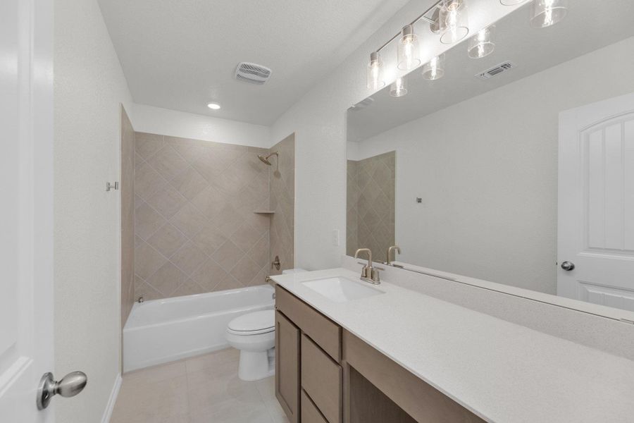 Furnished interior view inside a new home in Mustang Valley, Manor (Image 9).