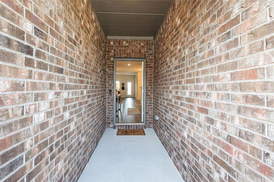 Entrance to property with brick siding Entrance to property with brick siding