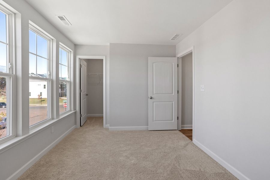 Spacious, unfurnished interior of a new home in Sweetbrier, Durham (Image 26).