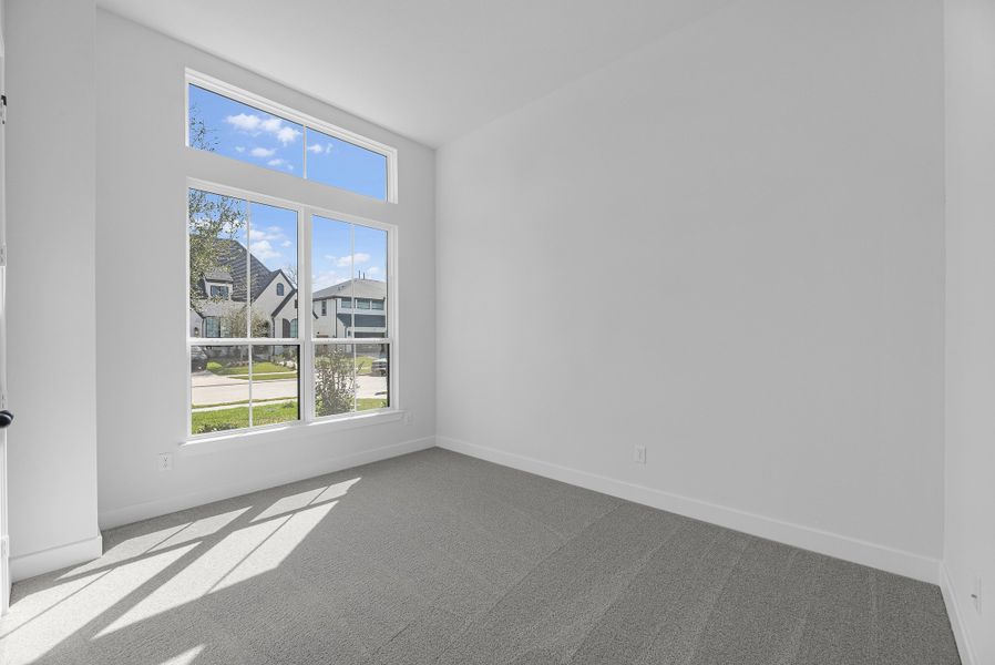 Spacious, unfurnished interior of a new home in Sienna, Missouri City (Image 11).
