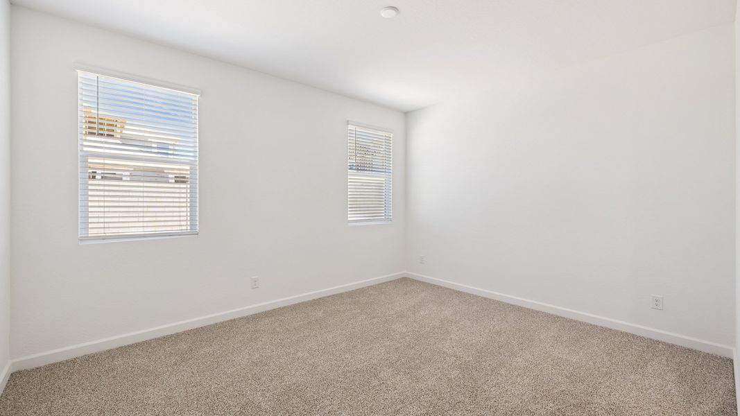 Spacious, unfurnished interior of a new home in Apache Farms, Buckeye (Image 21).
