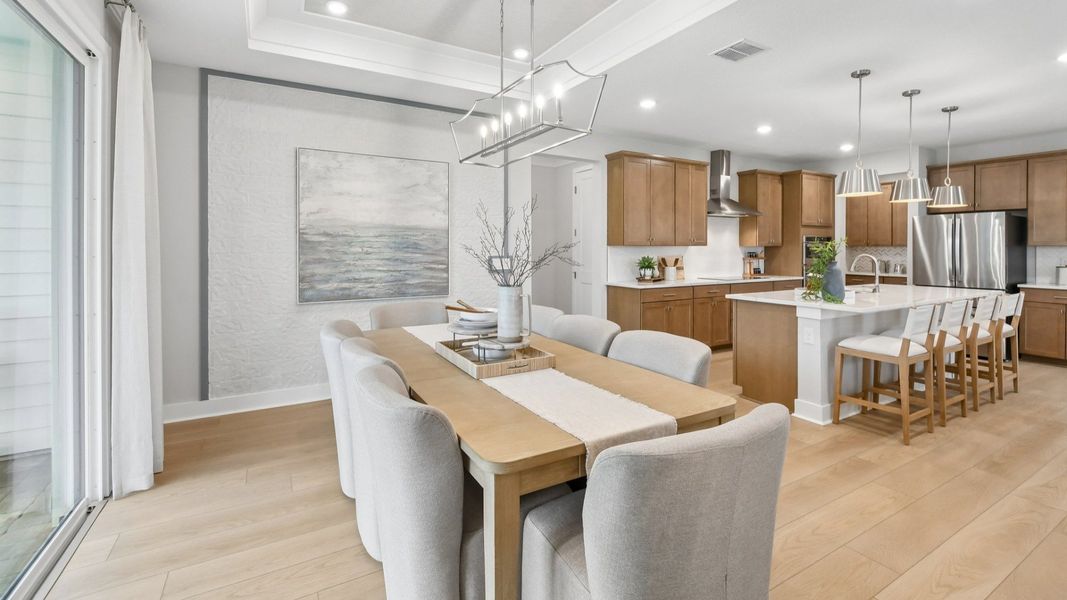 Dining Area and Kitchen in the Marigold Floor Plan at Haven at Diamond Springs