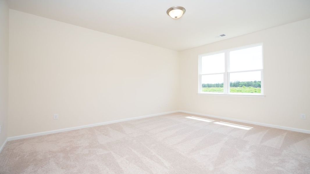 Representative unfurnished interior of a home built from the CALI by D.R. Horton in Lochaven, Conway (Image 32).