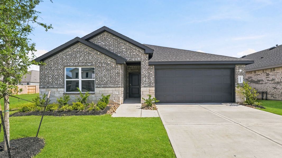 Representative exterior photo of a completed home built from the Burnet by D.R. Horton in Cypress Green, Hockley, TX (Image 1). Representative exterior photo of a completed home built from the Burnet by D.R. Horton in Cypress Green, Hockley, TX (Image 1).