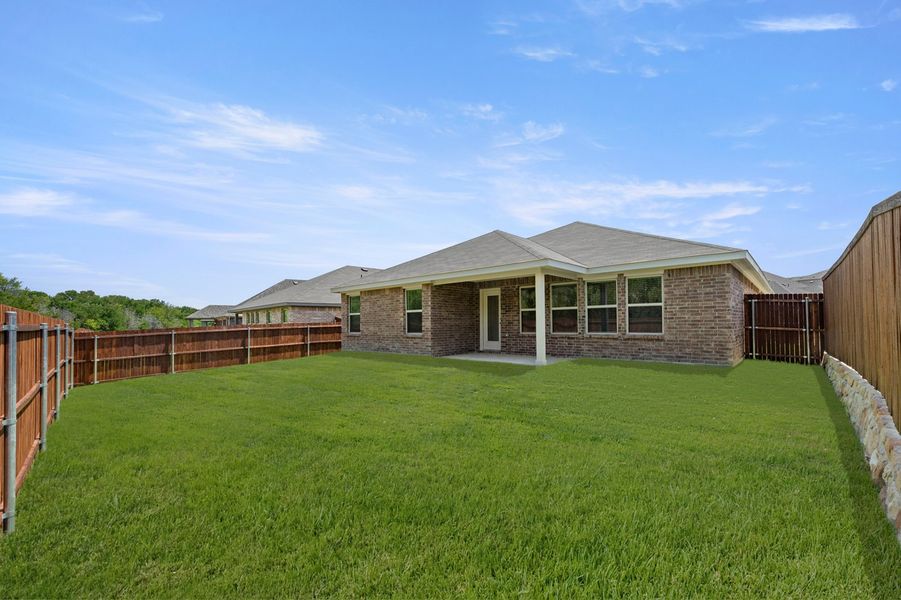Front exterior of a new home in ValleyBrooke, Mesquite, TX, highlighting curb appeal (Image 27). Front exterior of a new home in ValleyBrooke, Mesquite, TX, highlighting curb appeal (Image 27).