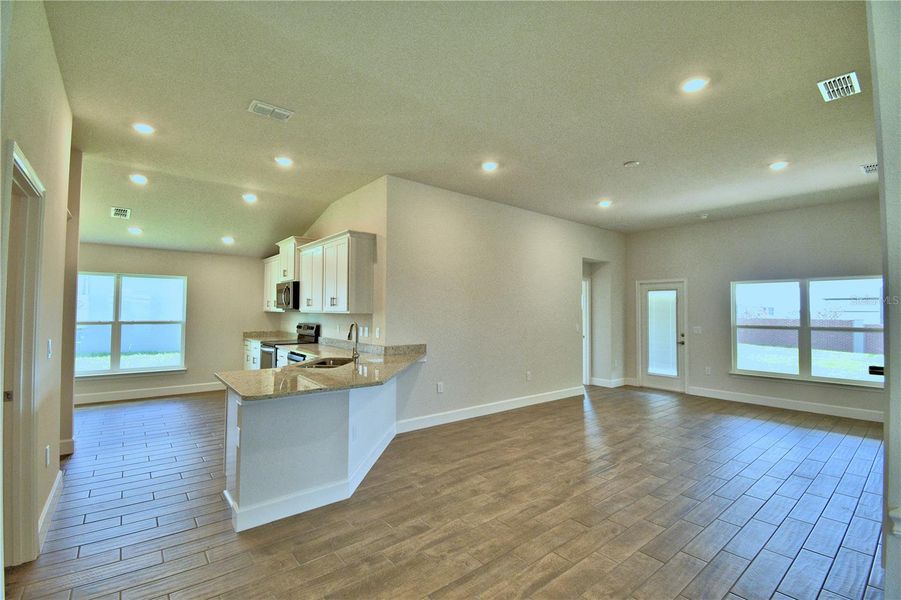Furnished interior view inside a new home in Lake Juliana Estates, Auburndale (Image 5).