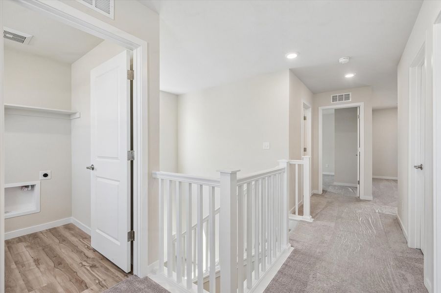 A white staircase in a house.