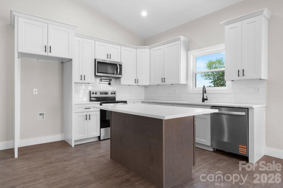 Furnished interior view inside a new home in , Lenoir (Image 8).