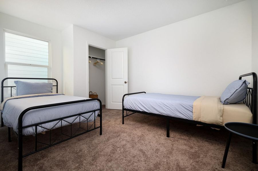 View of carpeted bedroom View of carpeted bedroom